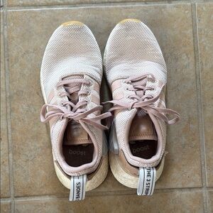 Adidas Blush and Cream NMDs running shoes